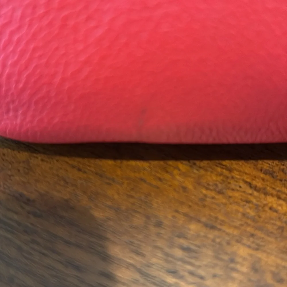 Kate Spade   Crossbody bag  leather orangeish red   bow on front chain strap det